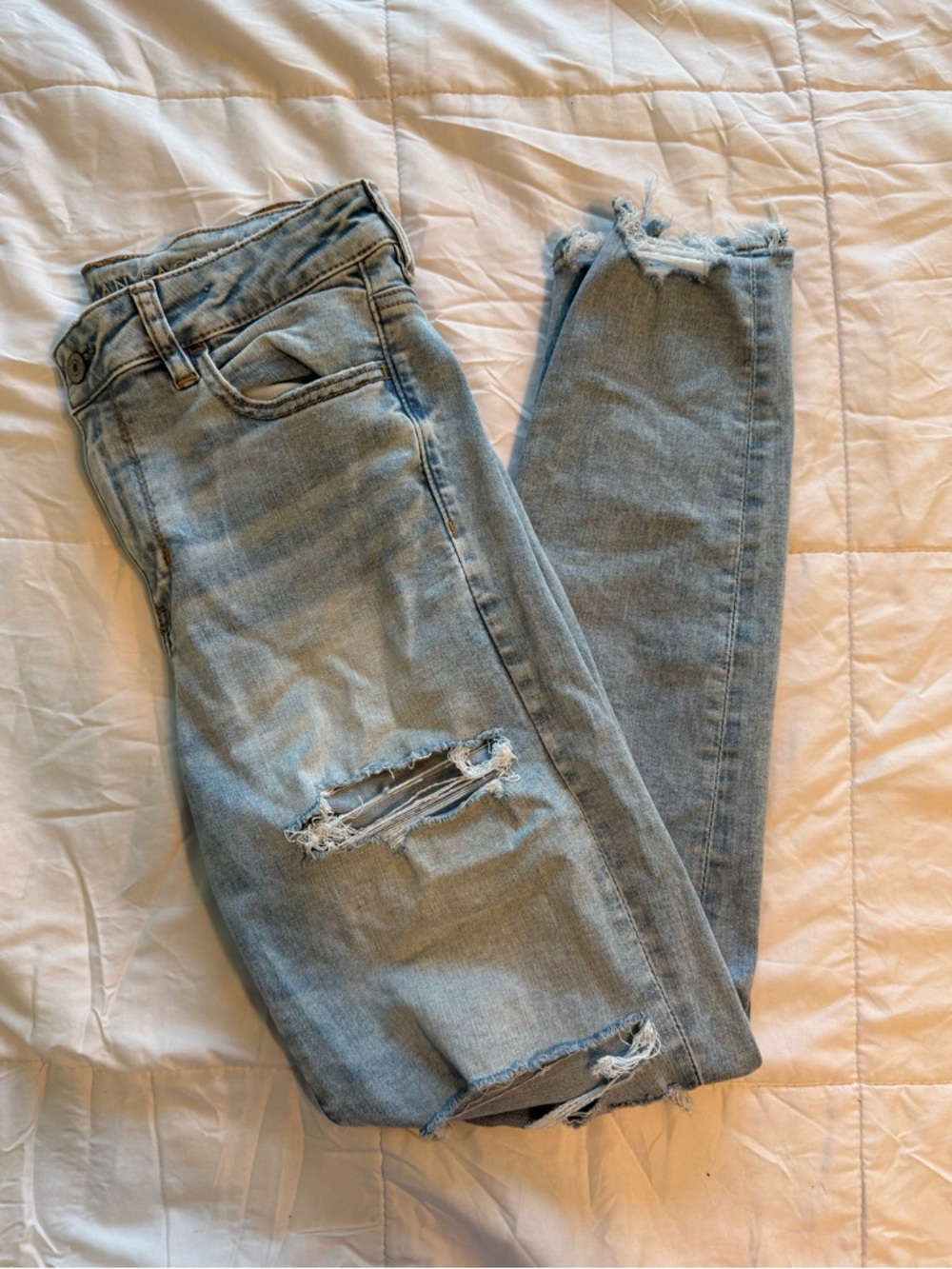 American Eagle Ripped Next Level Stretch Jeans